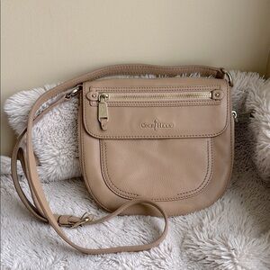 Cole Haan Tan Crossbody Bag  with little expansion.